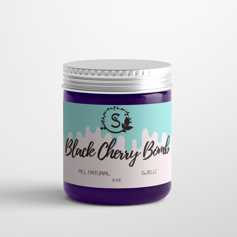 Scented cosmetic jar with silver lid, dark purple base, teal label reading Black Cherry Bomb