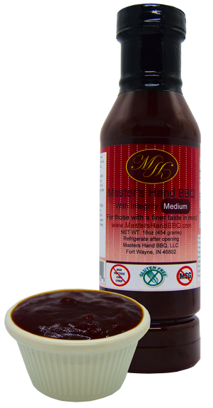 16 oz BBQ sauce jar with label; dark red-brown sauce in small cup