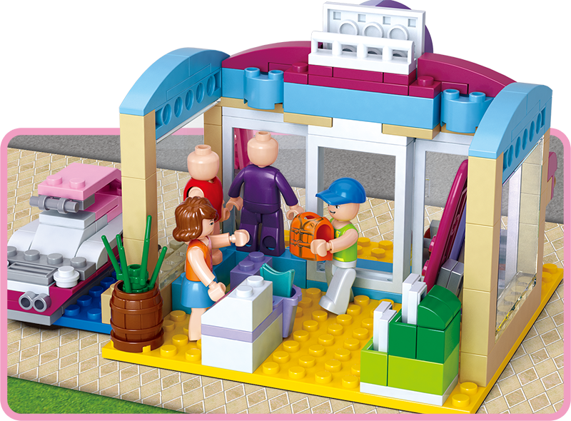 Surf shop building brick set with two-story doorway, surfboard, and accessory racks