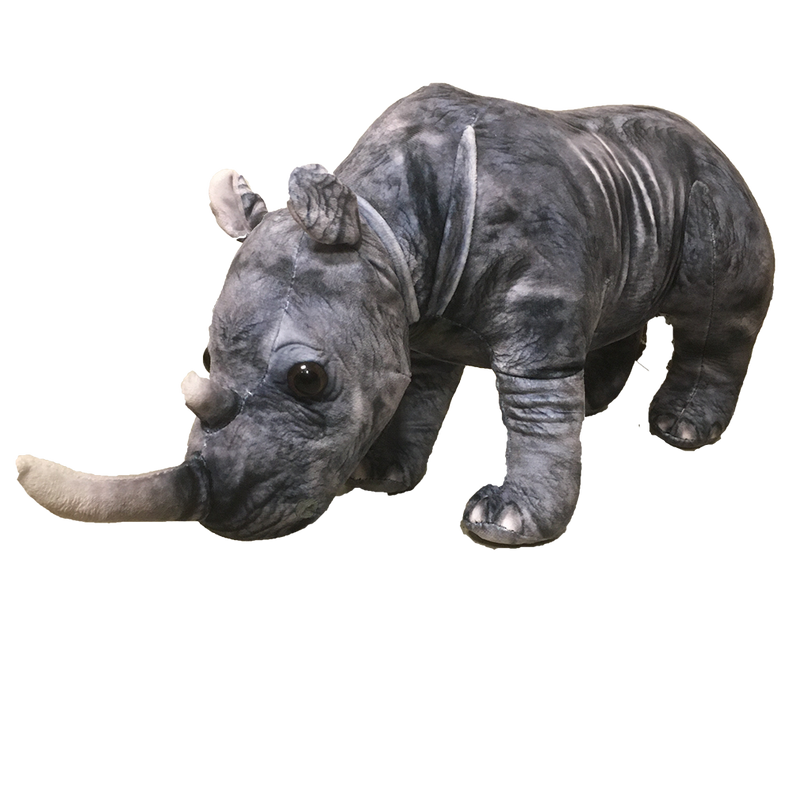 Gray rhinoceros plush with horn and wide eyes, side view
