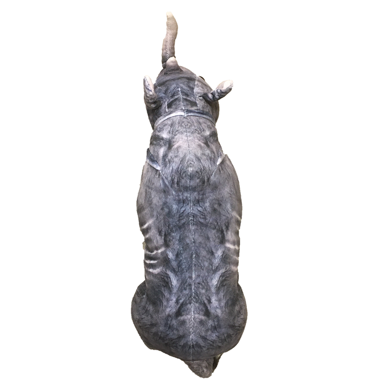 Gray rhino plush stuffed animal standing on all fours, back view