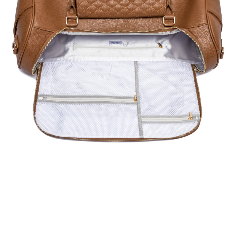 Caramel brown travel bag interior view with zip compartments and white lining