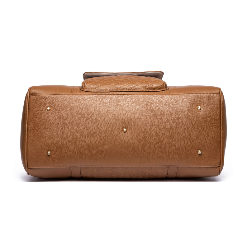 Caramel brown travel bag back view with small feet and metal rivets