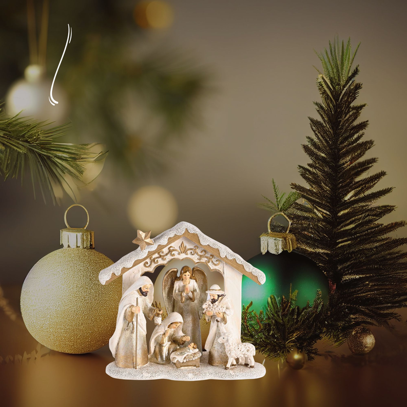 Nativity scene figurine with angel and animals under a white star roof, gold accents
