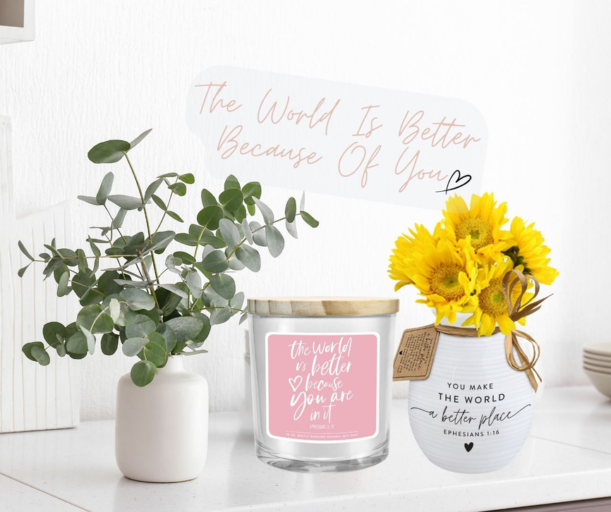 Soy candle jar with pink label and natural wood-tone lid, front view