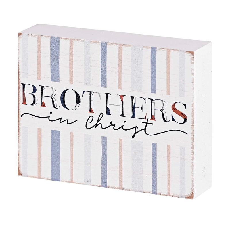 Tabletop plaque reading “BROTHERS in Christ”