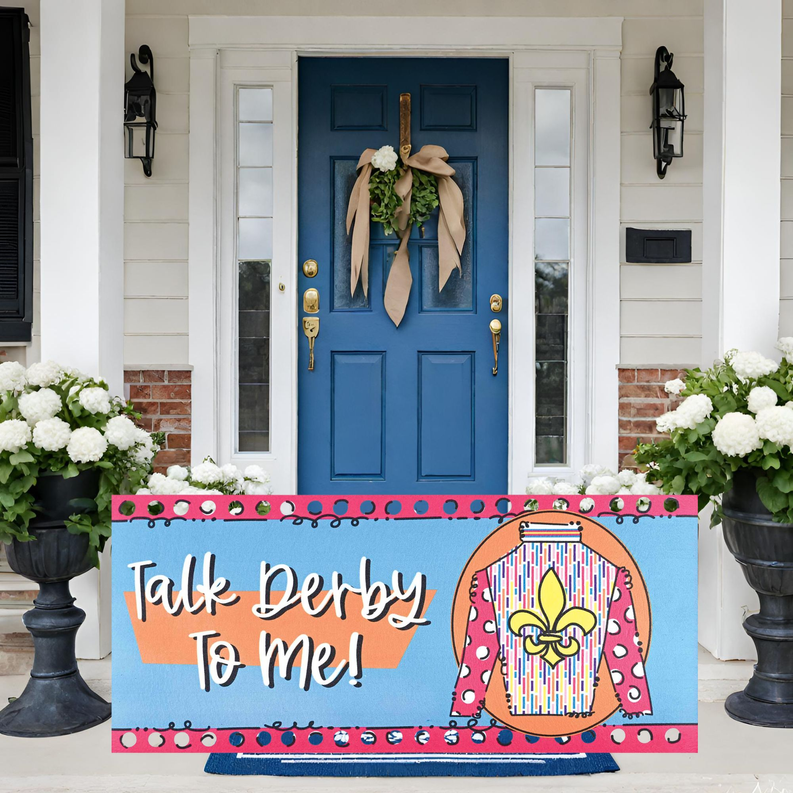 Blue and pink doormat insert featuring 'Talk Derby To Me' and jockey hat illustration
