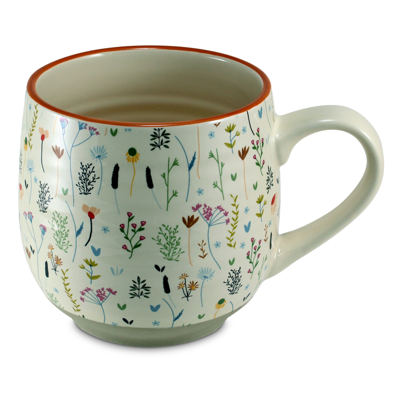 Floral ceramic coffee mug with multicolor botanical pattern and curved side handle