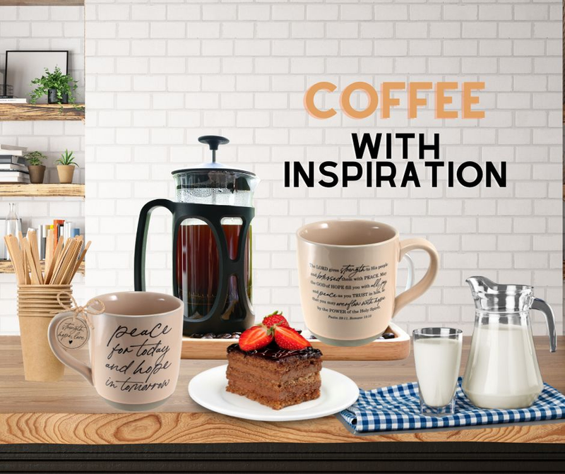 Peach-beige coffee mug on a table with "COFFEE WITH INSPIRATION" sign