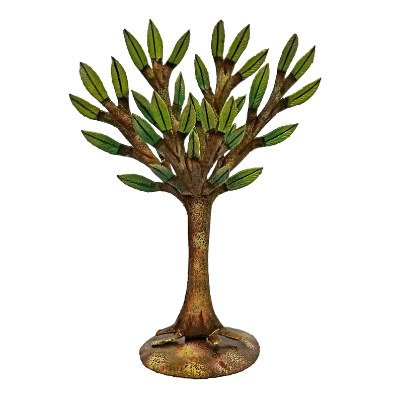 Painted freestanding tree sculpture with green leaf branches and brown trunk