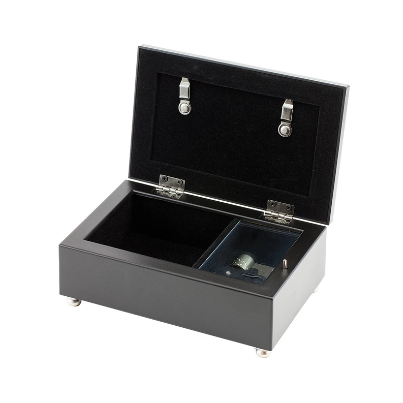 Open black confirmation keepsake box with velvet interior and hinged lid hardware