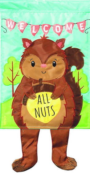 Outdoor welcome squirrel yard sign, brown costume-style squirrel holding 'All Nuts' badge