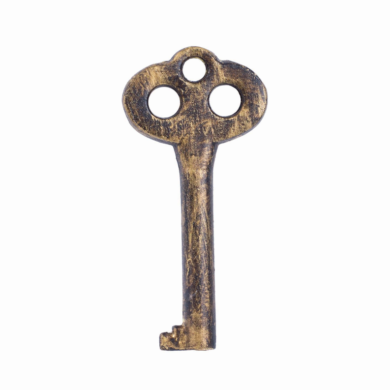 Antique-style key charm with three circular holes