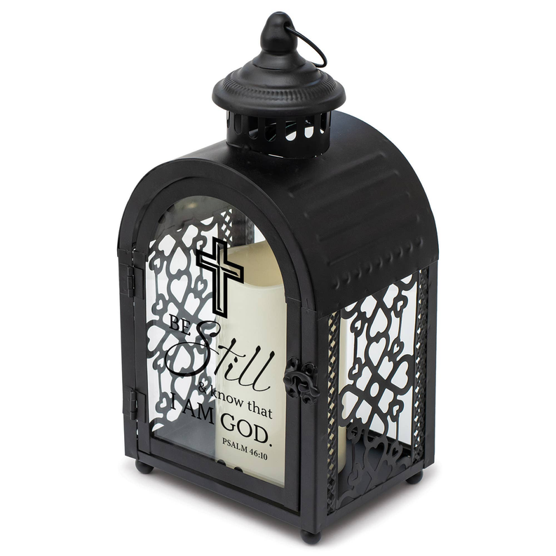 Black decorative lantern with arched glass panel showing cross and Psalm 46:10