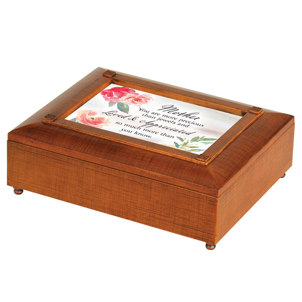 Wooden jewelry box with hinged lid and floral quote insert, open top view
