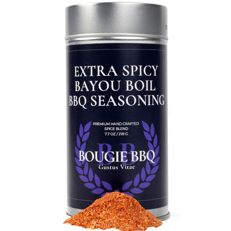 Extra Spicy Bayou Boil BBQ Seasoning can with orange seasoning pile