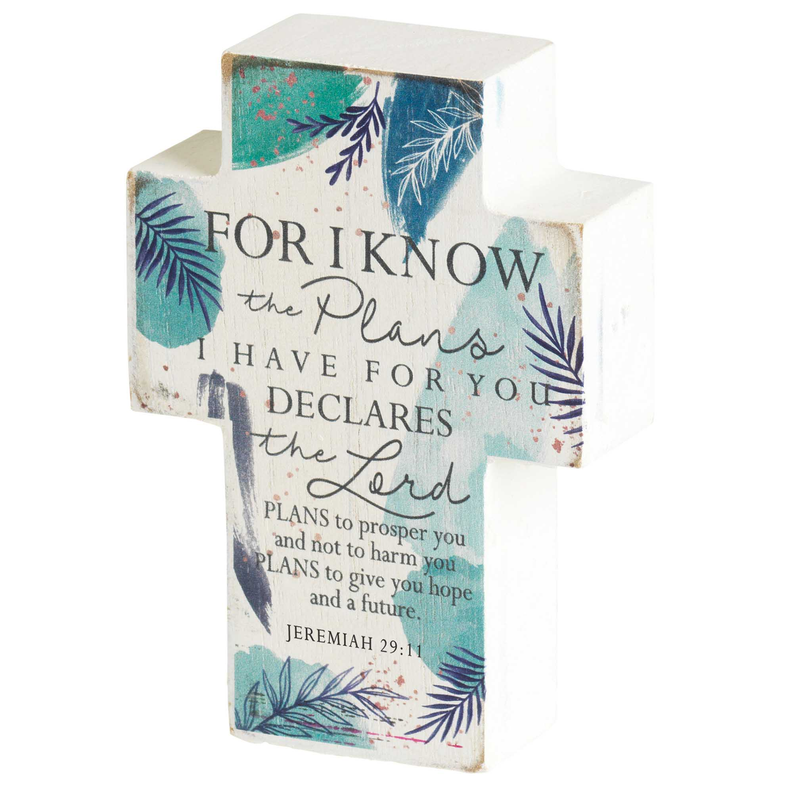 Tabletop cross plaque angled view with multicolor botanical verse print