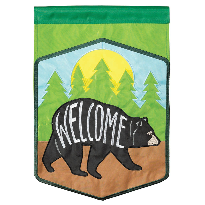 Hexagonal welcome bear garden flag with black bear, trees, and bold WELCOME lettering