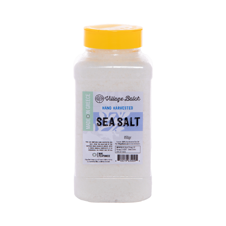 Sea salt jar with bright yellow lid and hand-harvested label