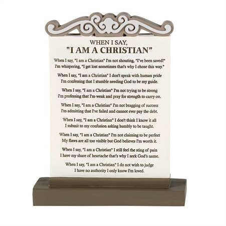 Tabletop Christian quote plaque with arched scroll frame and easel base, light tan