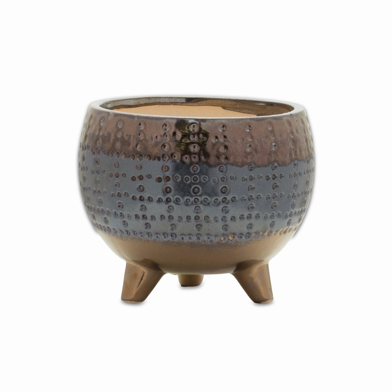 Small terracotta plant pot with three short legs, speckled glazed finish