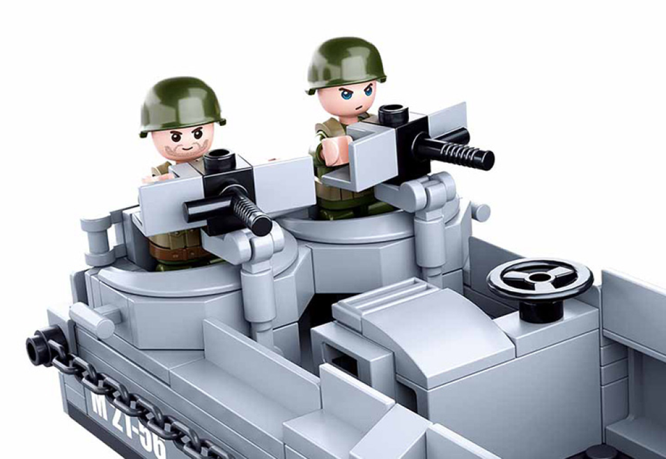 Close-up of gray brick-built landing craft deck with two minifig soldiers and turret gun