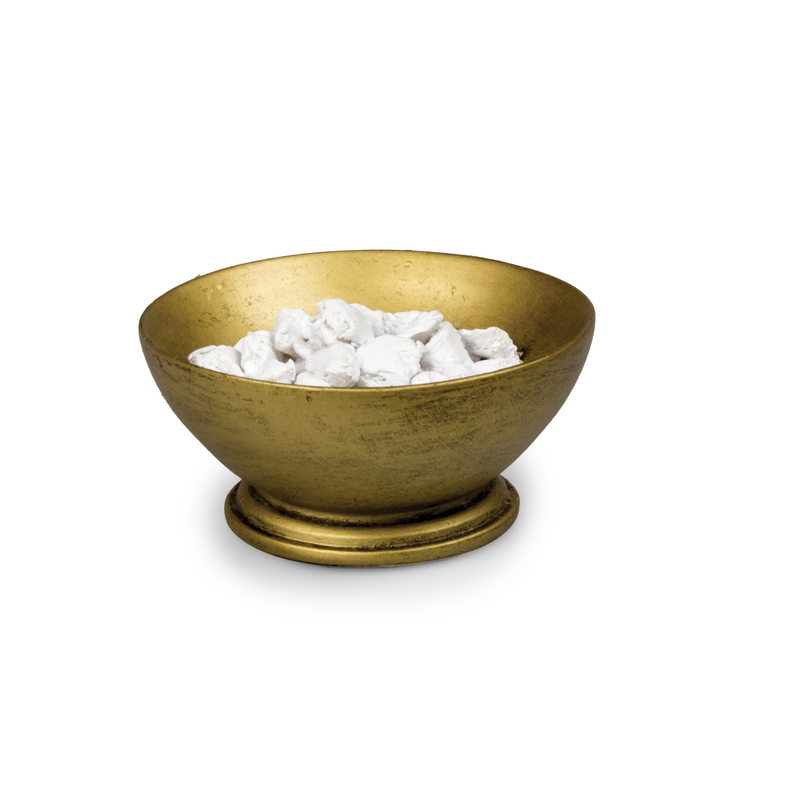 Gold chalice bowl sculpture filled with white stones or crystals