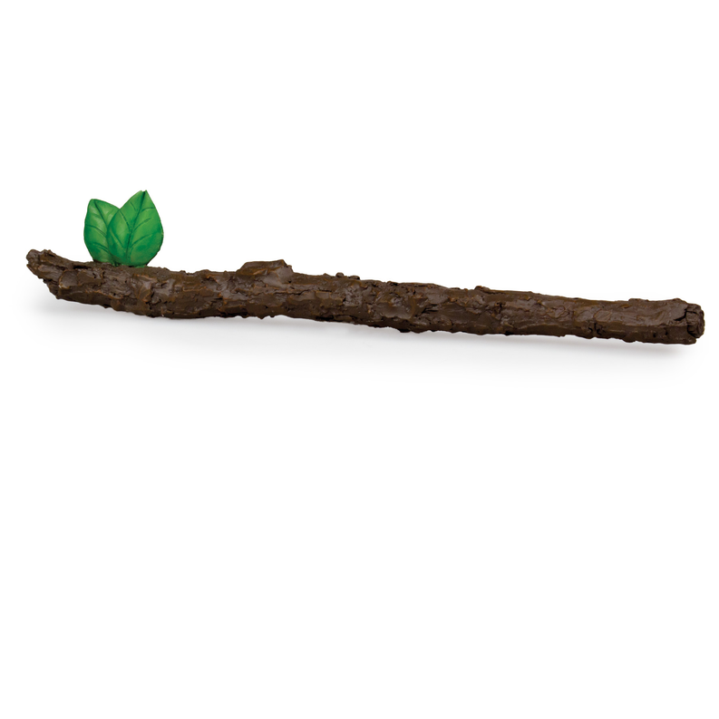 Dark wooden staff sculpture with a small green leaf sprig on one end