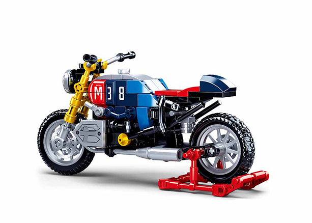 Motorcycle brick model in blue, red, and black with gold fork and chrome exhaust