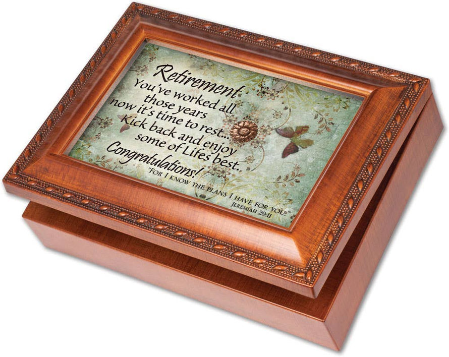 Retirement inspirational music box with wood-grain frame and glass panel with engraved message