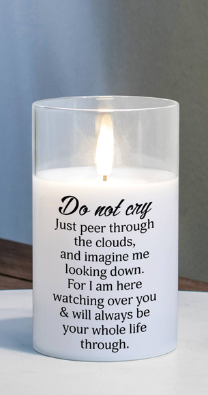 LED candle with 'Do not cry' quote printed on front, glowing flame behind glass