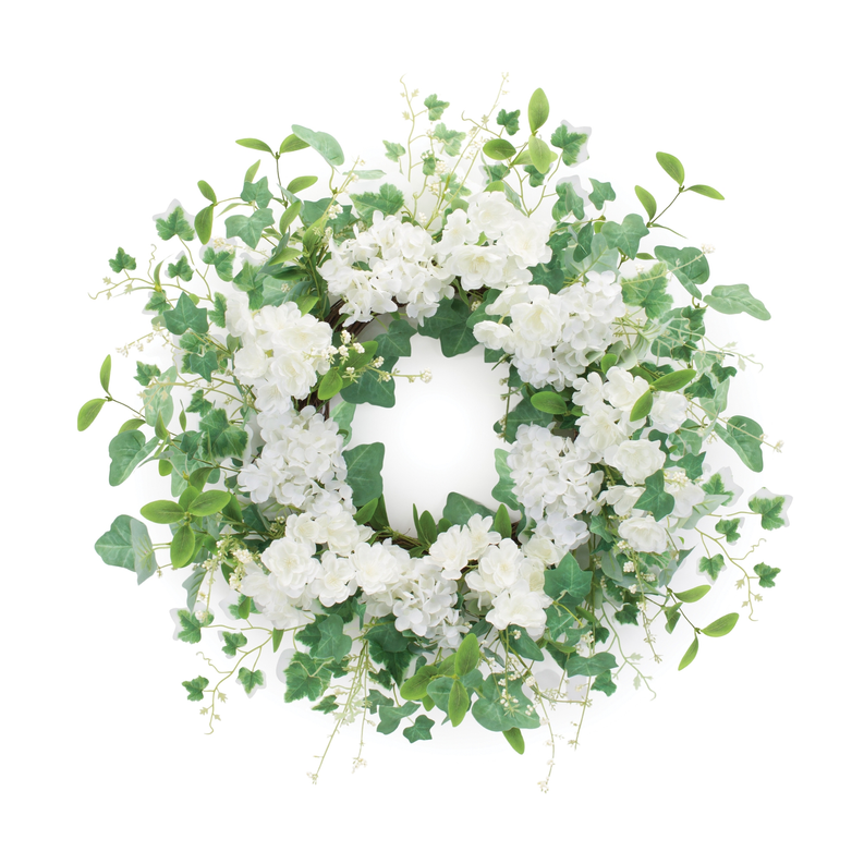 Wreath of white hydrangeas and green ivy leaves on a circular frame