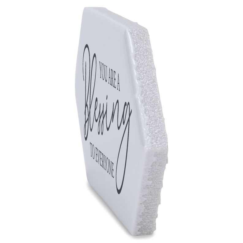 Tabletop white tile side view with black lettering: “You are a Blessing”