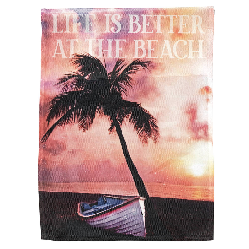 Garden flag with palm tree and beach sunset, boat and text “Life is better at the beach”.
