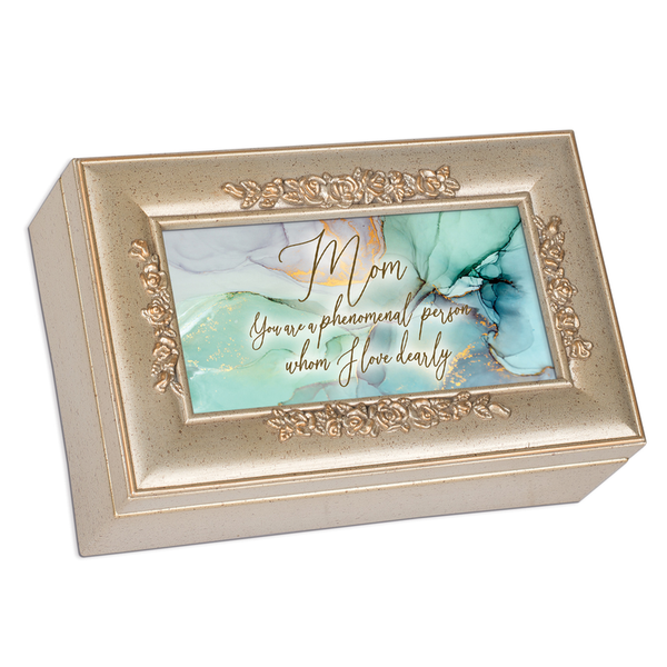 Gold-toned decorative music box with framed "Mom" message in teal and blue abstract