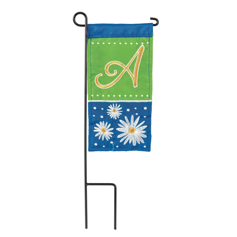 Green and blue monogram mini flag with daisies and A letter on black stand