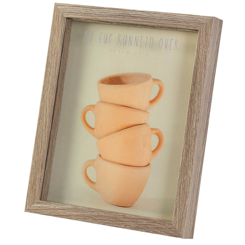 Framed wall art of stacked peach cups with 'My cup runneth over' text