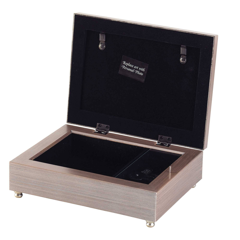 Open wood music box with black velvet lining, clasp latches, and song card slot