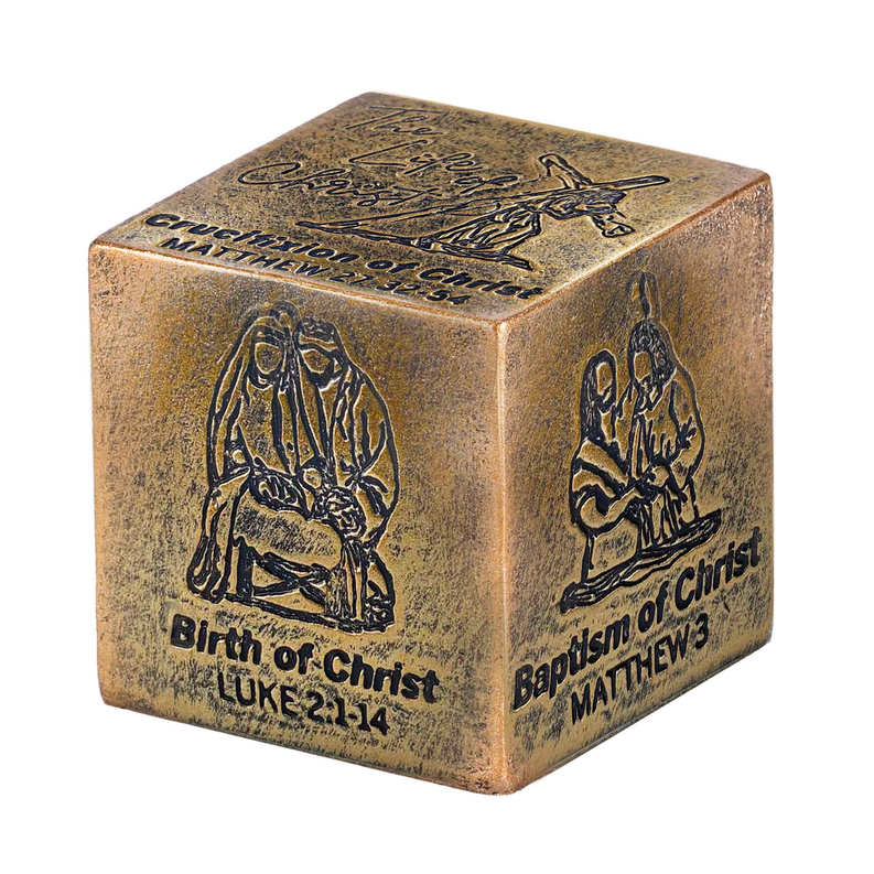 Antique gold cube with engraved figures and text: "Birth of Christ" and "Baptism of Christ"