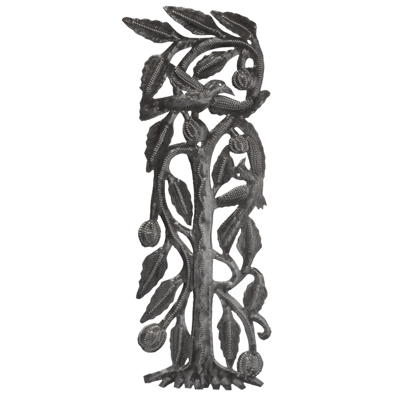 Tall metal tree sculpture with curling leaves and bird silhouettes