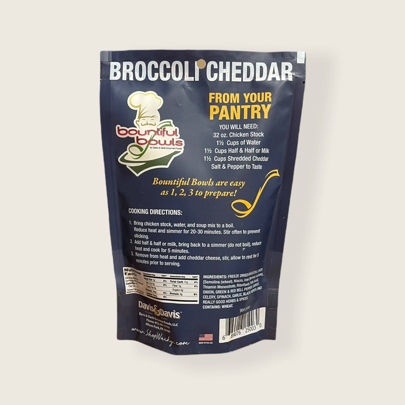 Broccoli cheddar soup mix pouch, dark blue and gold branding, standing upright