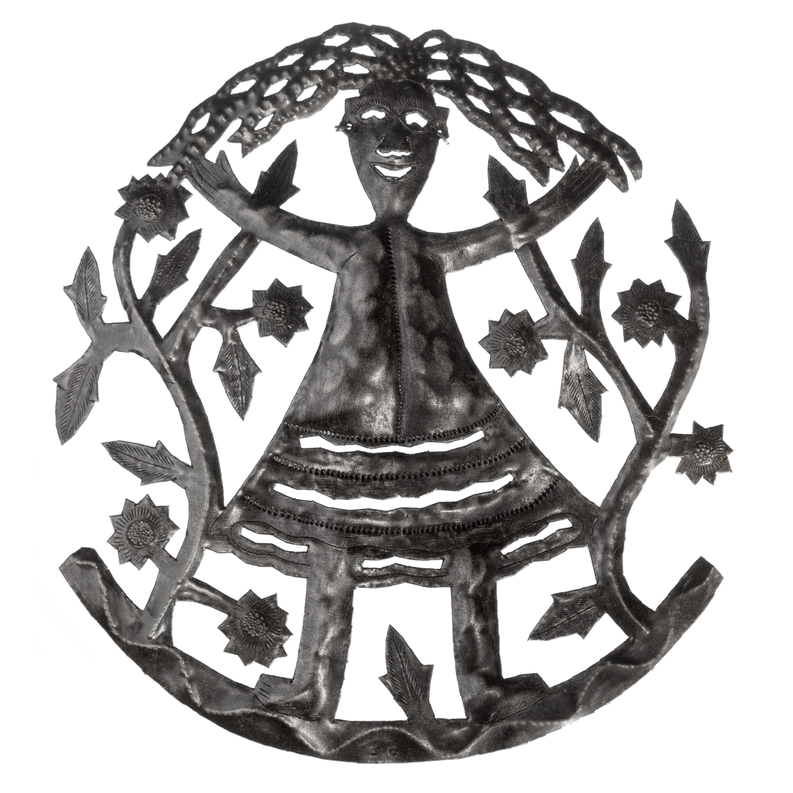 Dark metal cutout of a smiling girl in a circular star wreath decoration