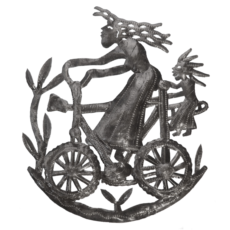 Small bicycle girl metal sculpture, dark gray figure riding a bicycle
