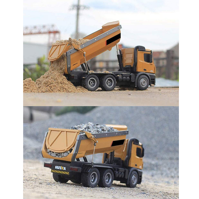 RC construction dump truck with tipped load bed and rear lifting bucket, sandy brown