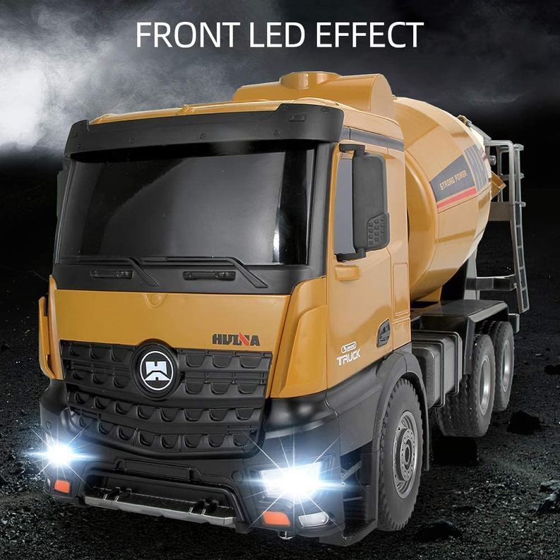 RC cement mixer truck with tan cab and drum, front LED lights glowing