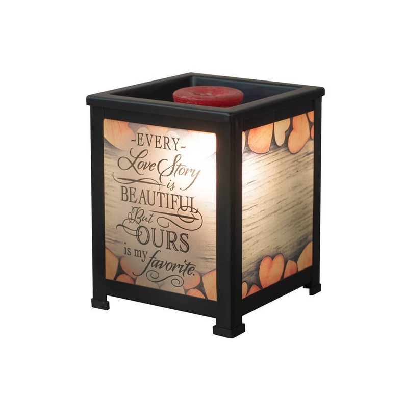 Black glass lantern warmer with printed panels and red candle on top