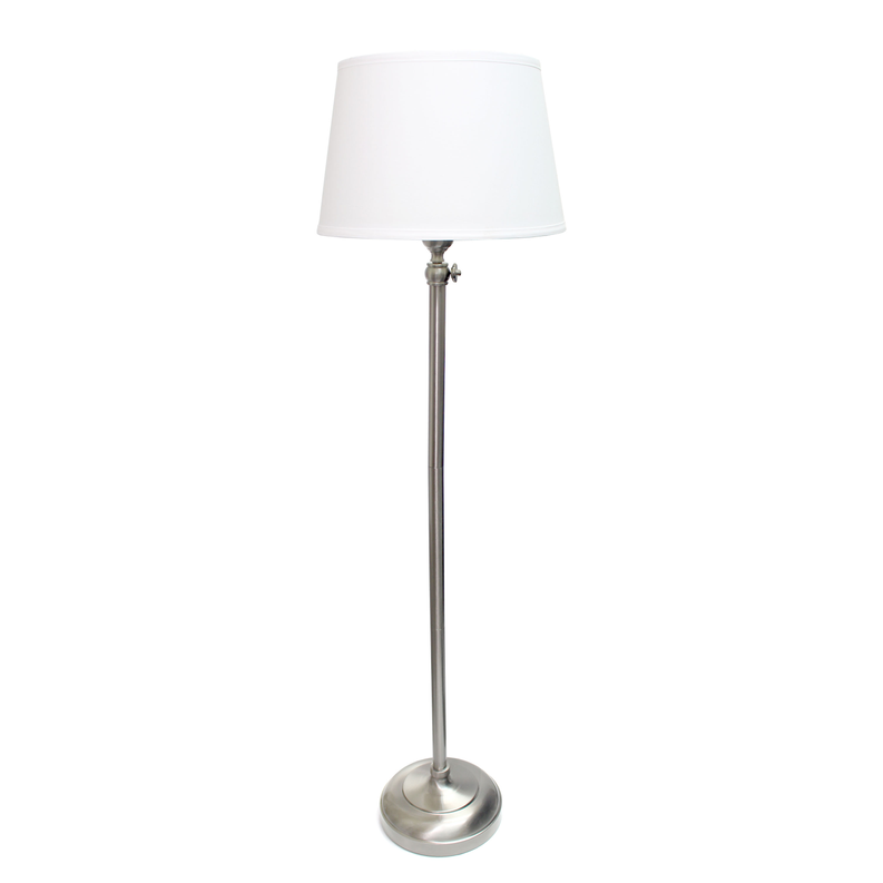 Modern floor lamp with white fabric shade and brushed metal base on slim metal pole