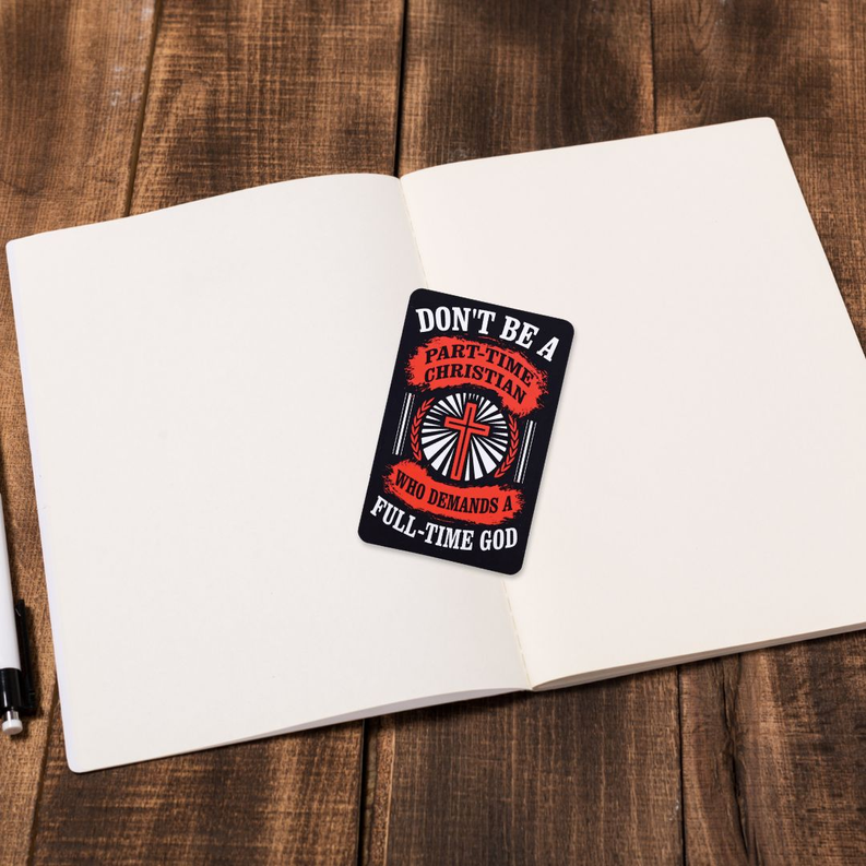 Pocketcard placed on an open notebook, showing the cross quote design