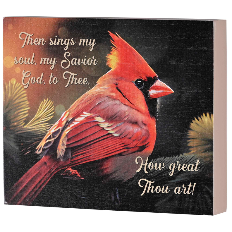 Tabletop plaque showing red cardinal, golden plants, and white scripture text