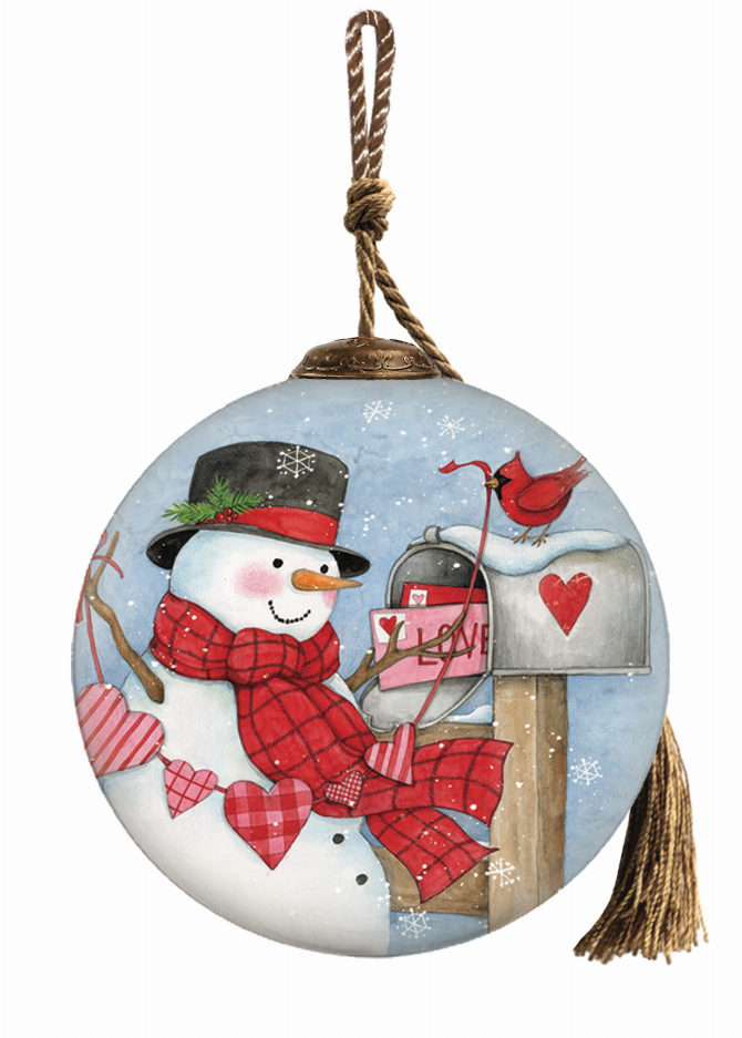 Round blue glass snowman ornament with red birds and hearts, hanging on twine with tassel